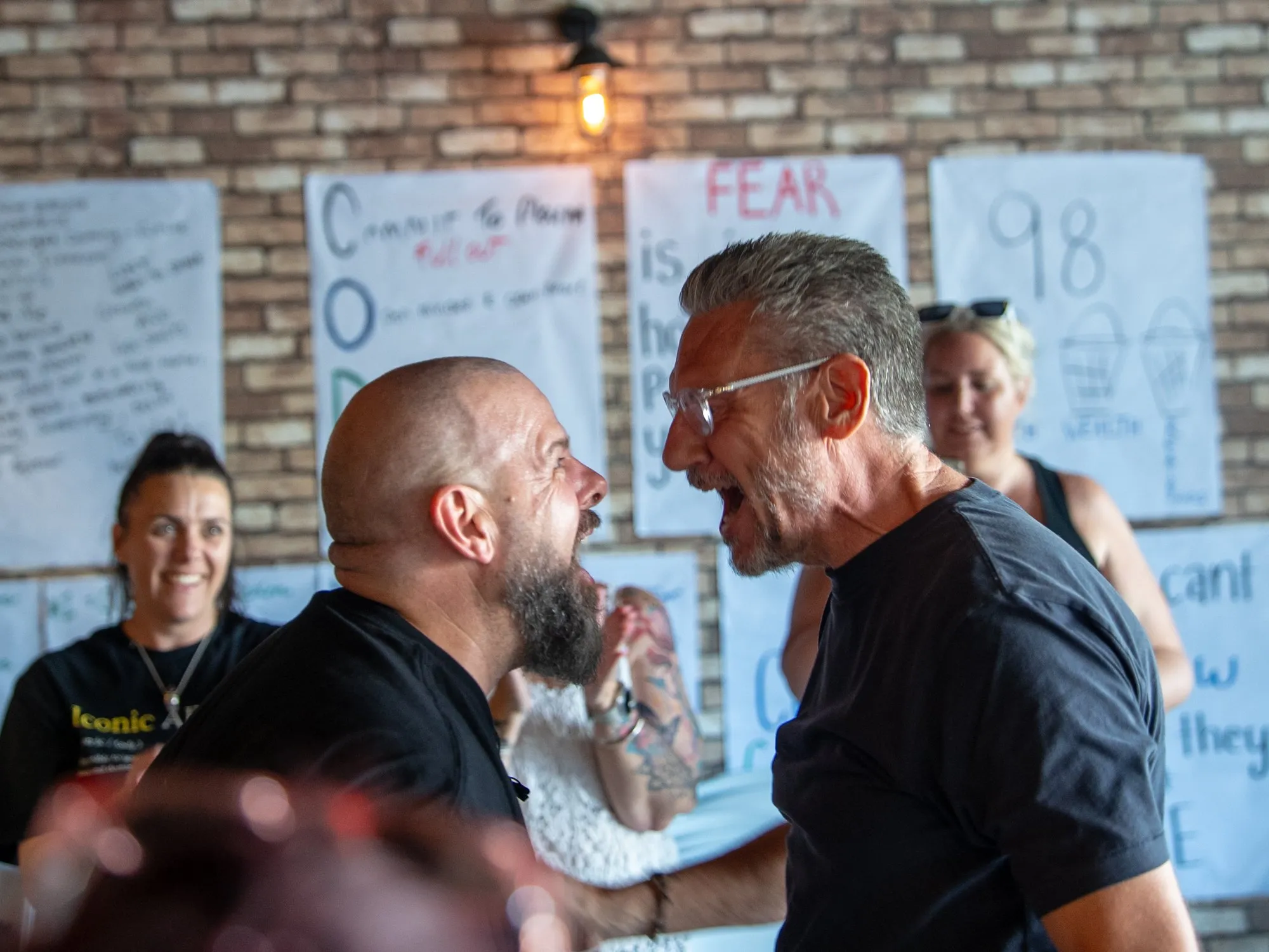 Brett in a face-to-face role-play with a workshop participant